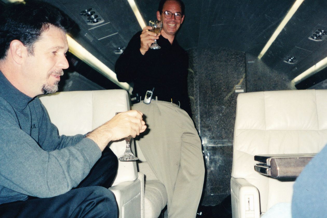 Reed Hastings and Marc Randolph celebrate Netflix IPO on a Plane