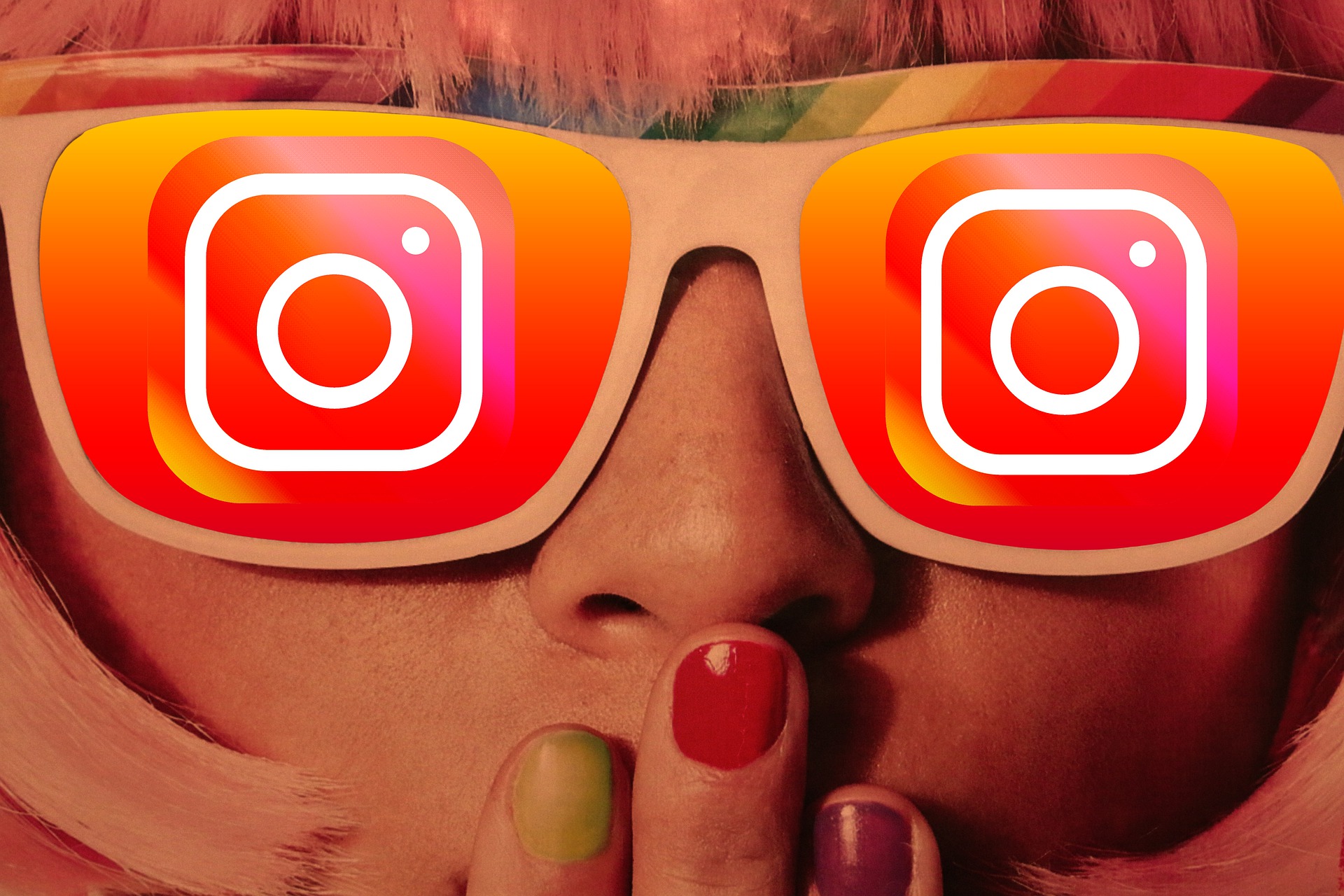 Girl with glasses that has the Instagram Logo on both lenses