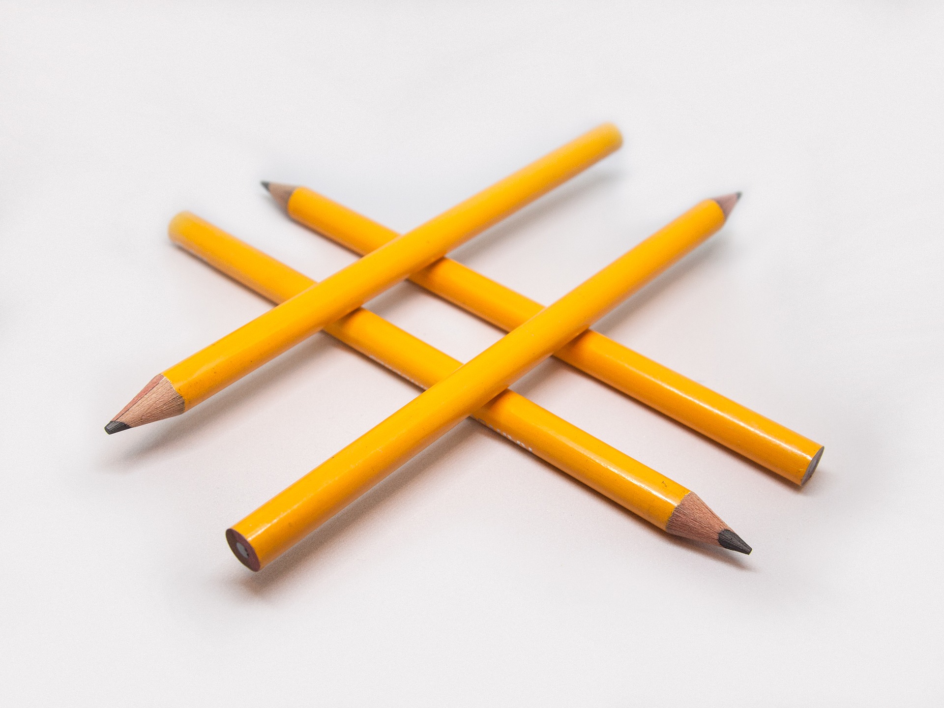 Four pencils forming a hashtag